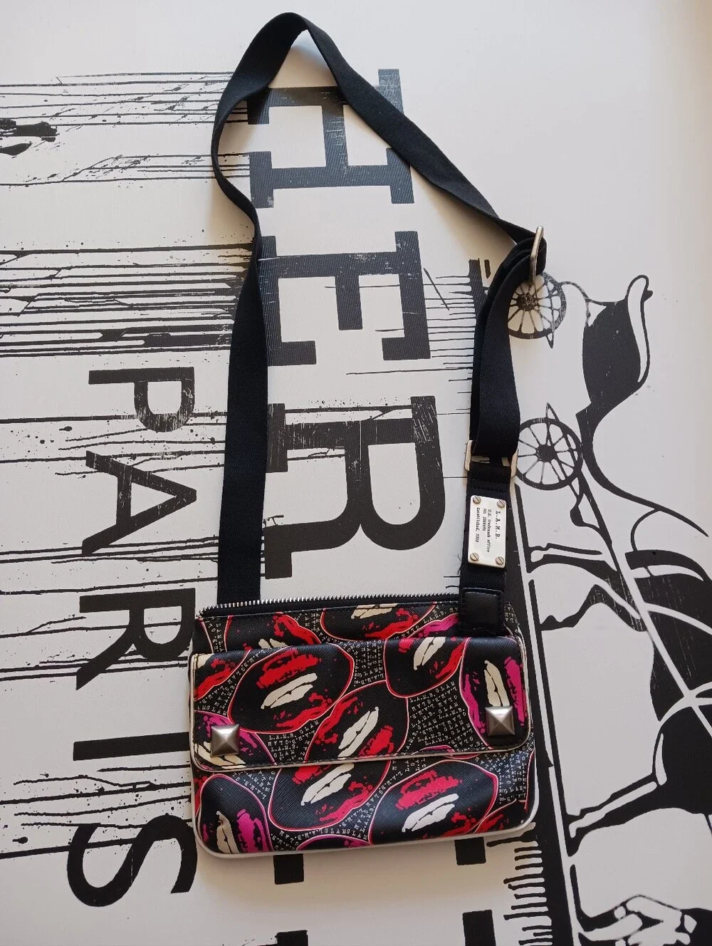 L.A.M.B Gwen Stefani Vintage .Black Lip-Print Crossbody Bag with Silver Hardware